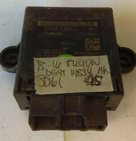 2013-2013 Ford Fusion rear passenger door control module DG9T-14B534 AK.