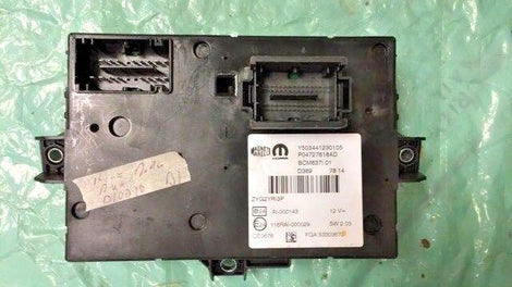 2014-2015 Dodge Ram pickup BCM body control module junction box P04727618AD.